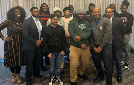  Students from the CUNY Fatherhood Academy receive a gift of kindness and a message of service.